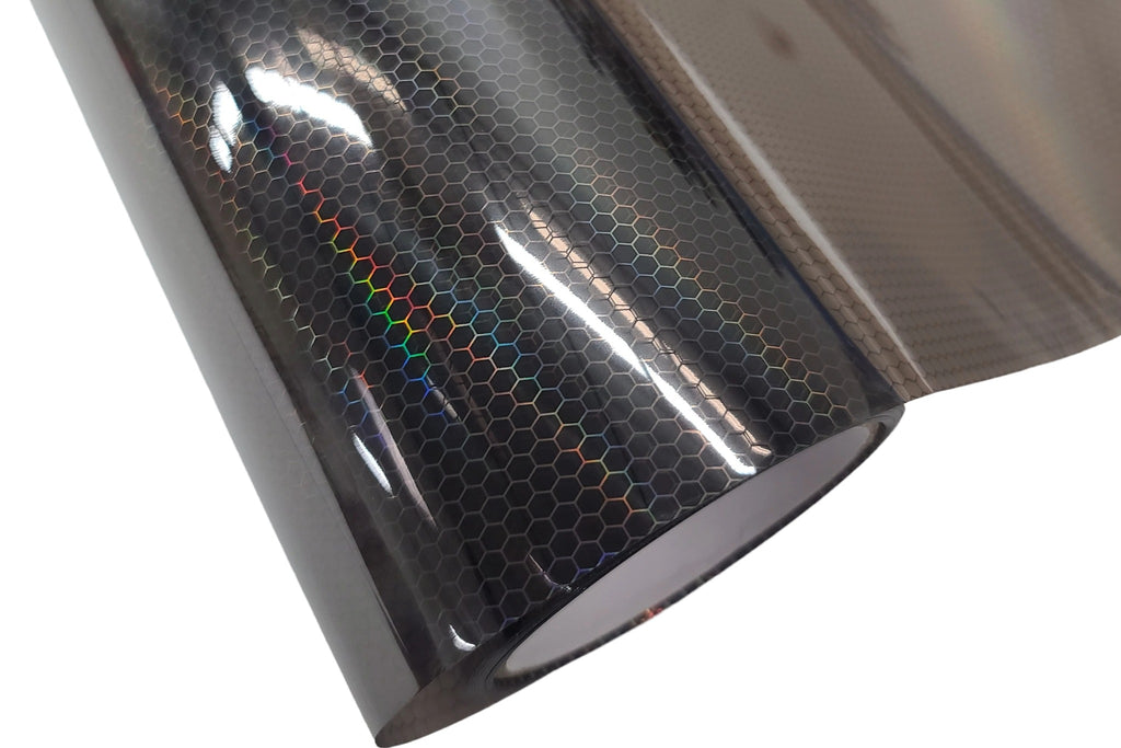 Roll of Light tint film with a honeycomb pattern in gloss black holographic laser color